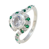 Ying elegant green gemstone ring for women featuring a large central clear stone surrounded by smaller green and clear stones